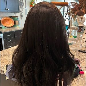 Beautiful synthetic wig unit.